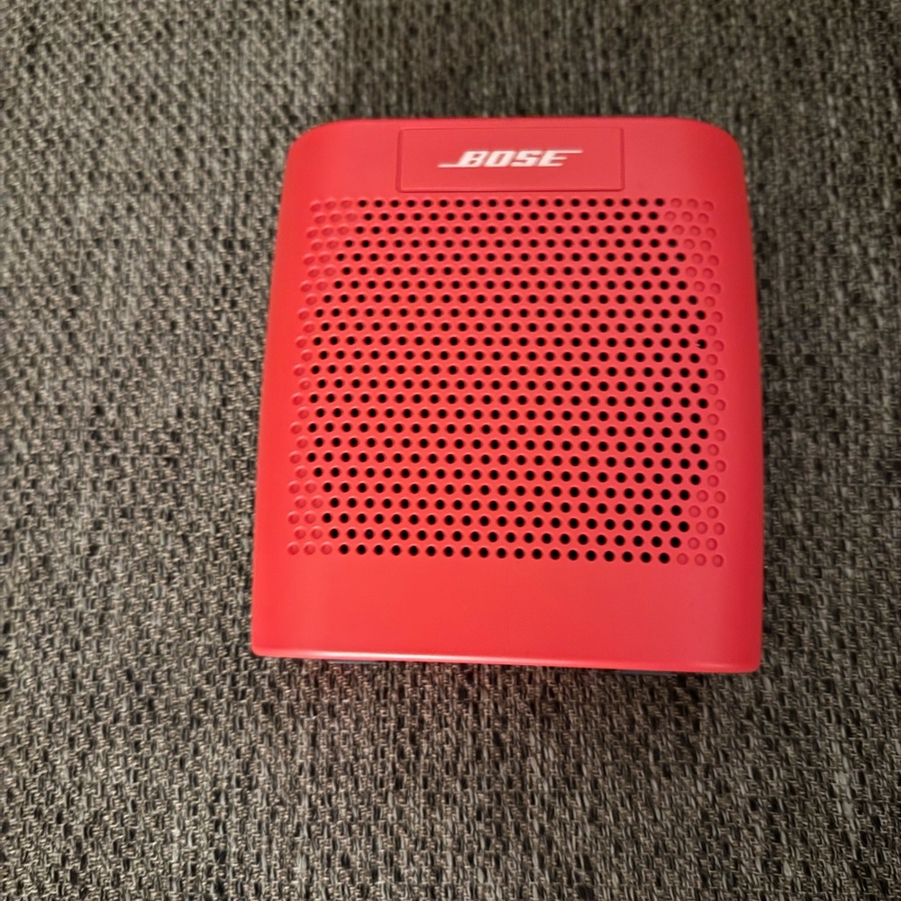 Bose Red Compact Portable Speaker with Sleek Design